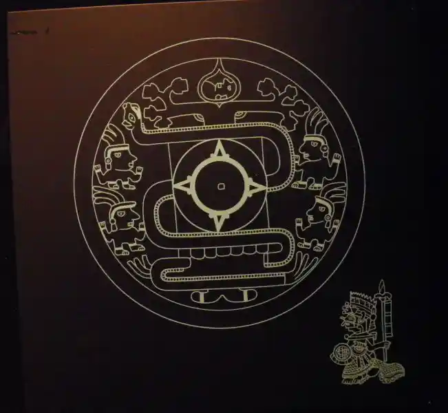 Four point solar disc on an Mixtec Aztec ceremonial shield, the turquoise mosaic Four point solar disc on an Mixtec Aztec ceremonial shield, the turquoise mosaic